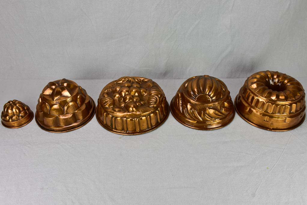 Collection of five late 18th / early 19th century copper cake molds