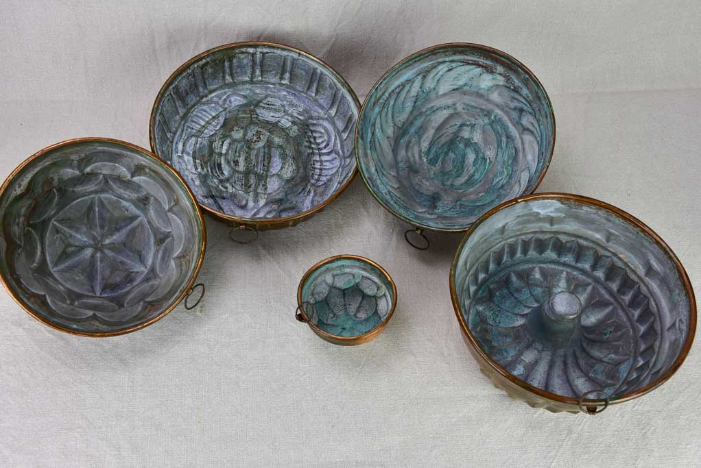 Collection of five late 18th / early 19th century copper cake molds