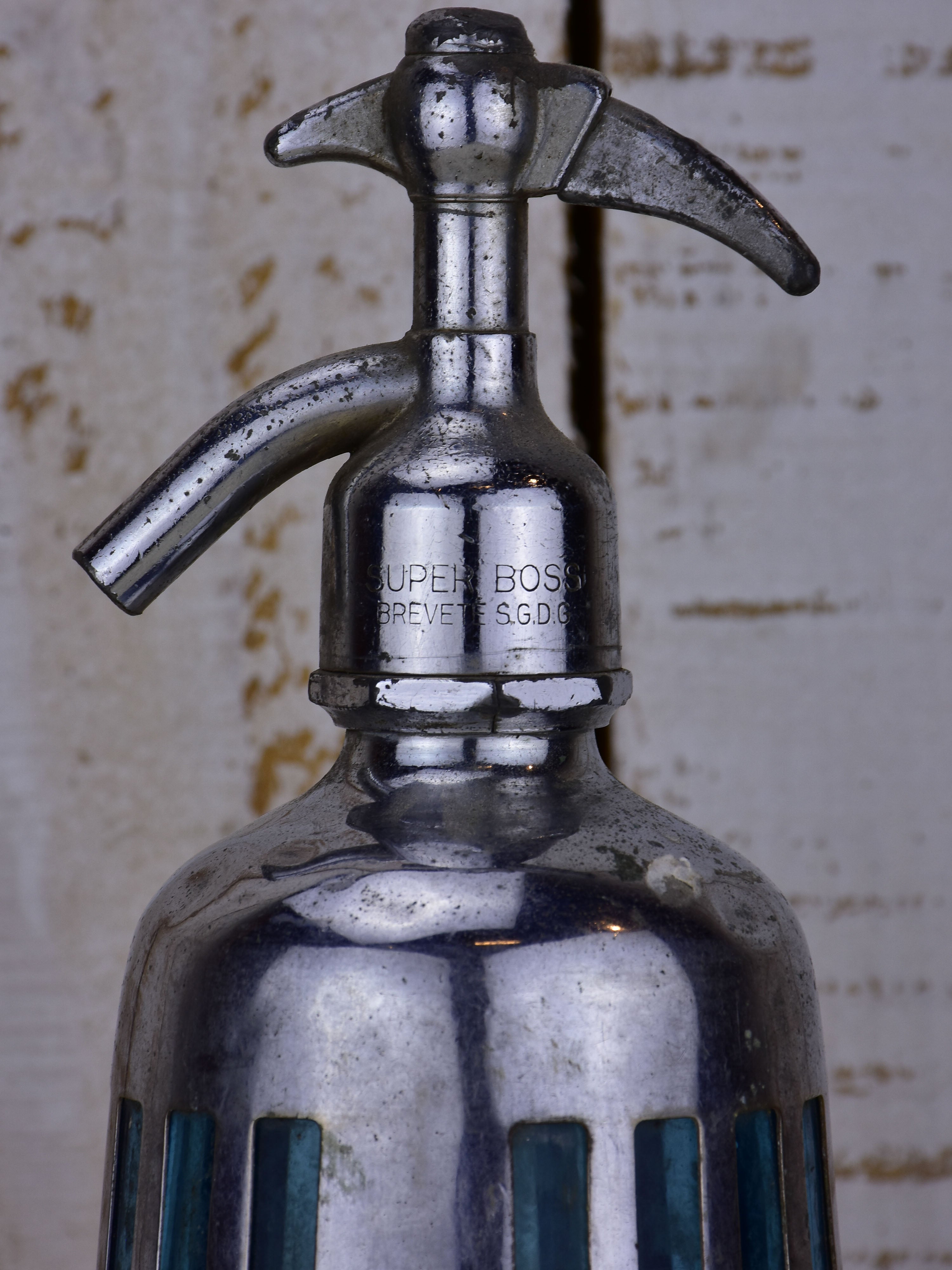 Antique French Seltzer bottle with metal casing