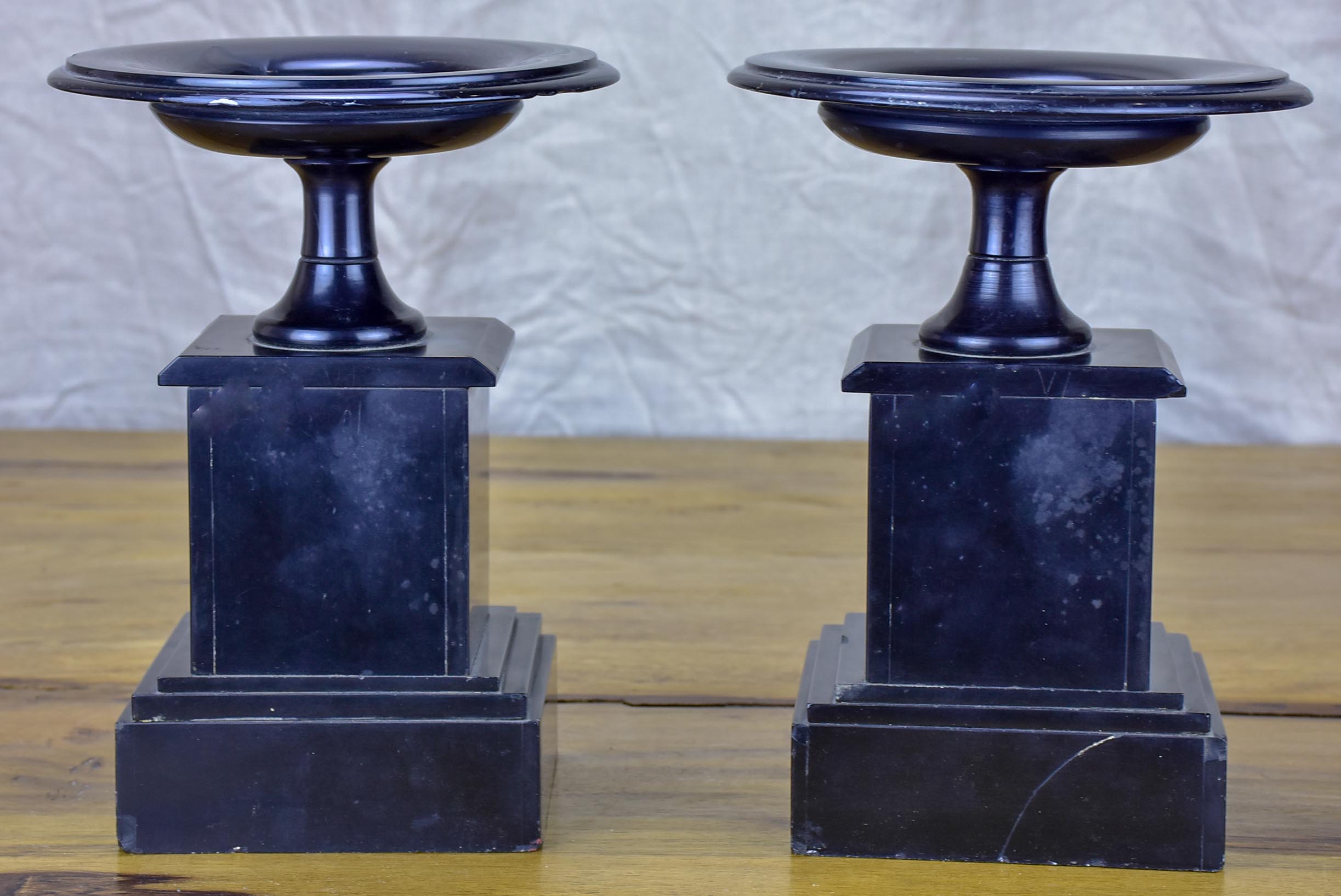 Pair of black stone and marble mantle piece vide poche