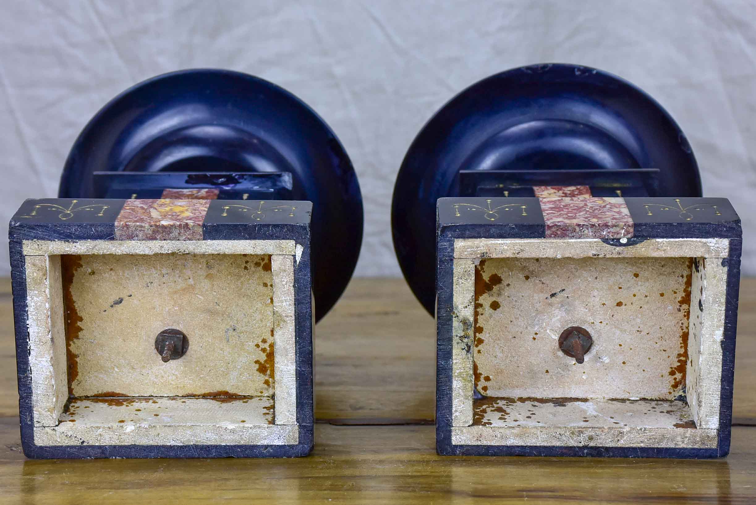 Pair of black stone and marble mantle piece vide poche