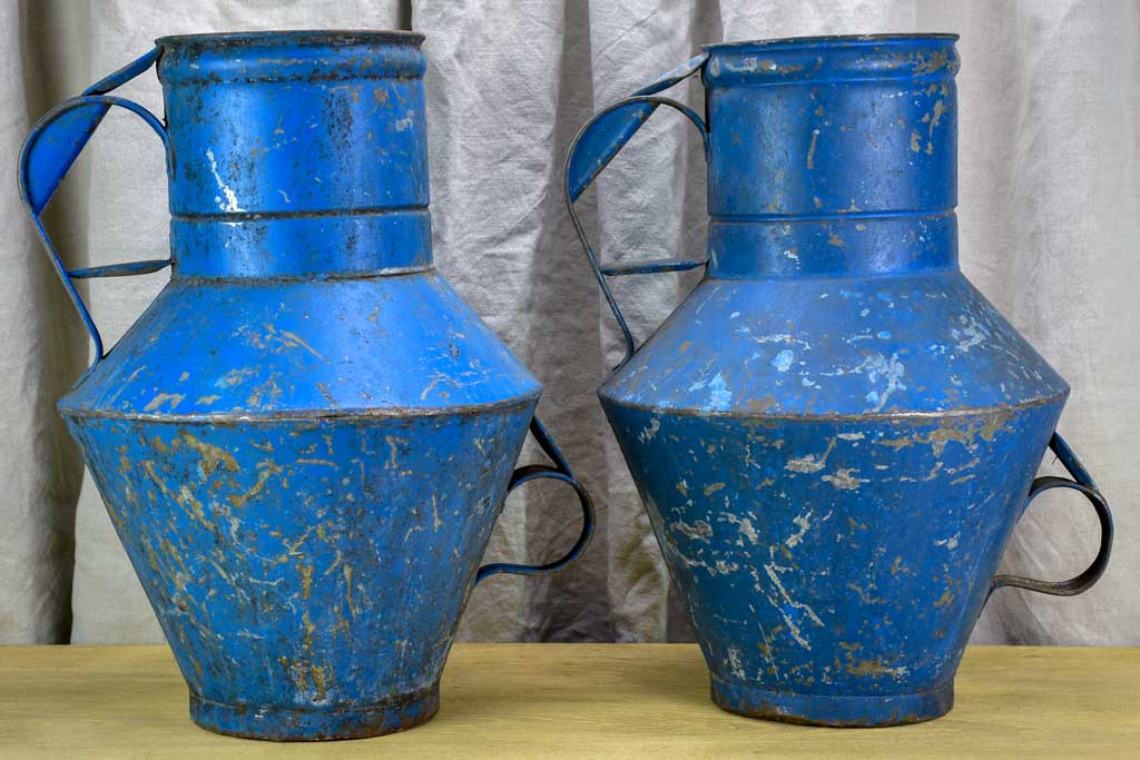 Pair of rustic blue agricultural vessels 20"