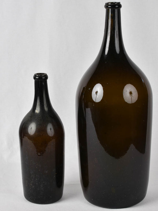 Impressive black glass wine bottles from Arles