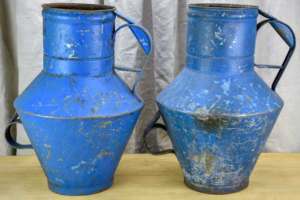 Pair of rustic blue agricultural vessels 20"