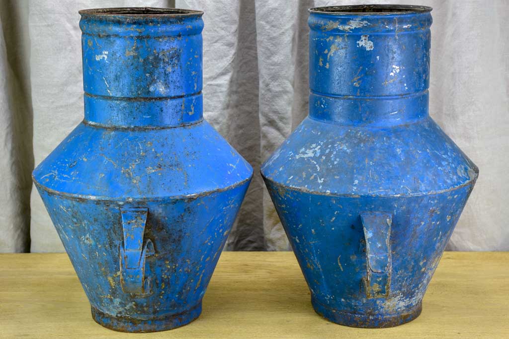Pair of rustic blue agricultural vessels 20"