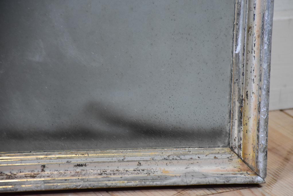 Small late 19th-century rectangular mirror with silver-leaf frame