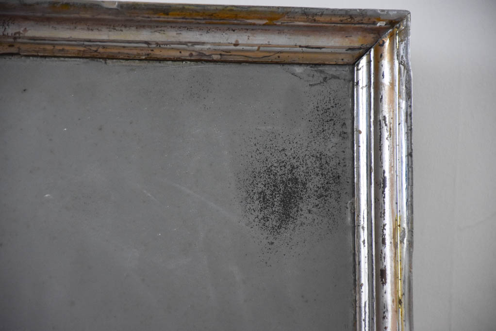 Small late 19th-century rectangular mirror with silver-leaf frame