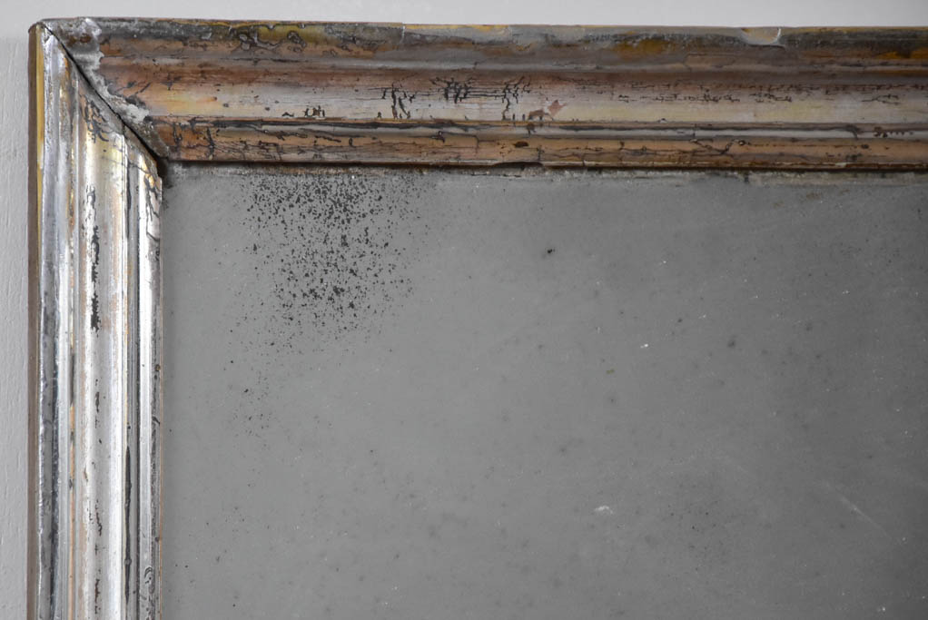 Small late 19th-century rectangular mirror with silver-leaf frame