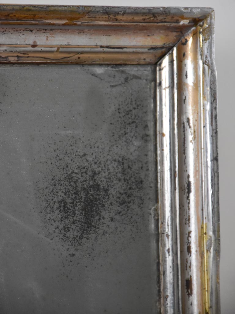 Small late 19th-century rectangular mirror with silver-leaf frame