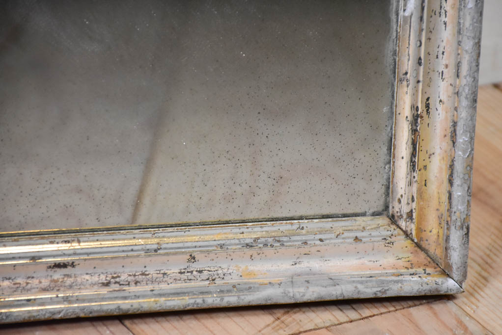 Small late 19th-century rectangular mirror with silver-leaf frame