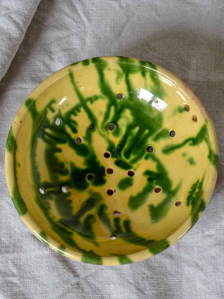 Vintage French strainer with green and yellow glaze