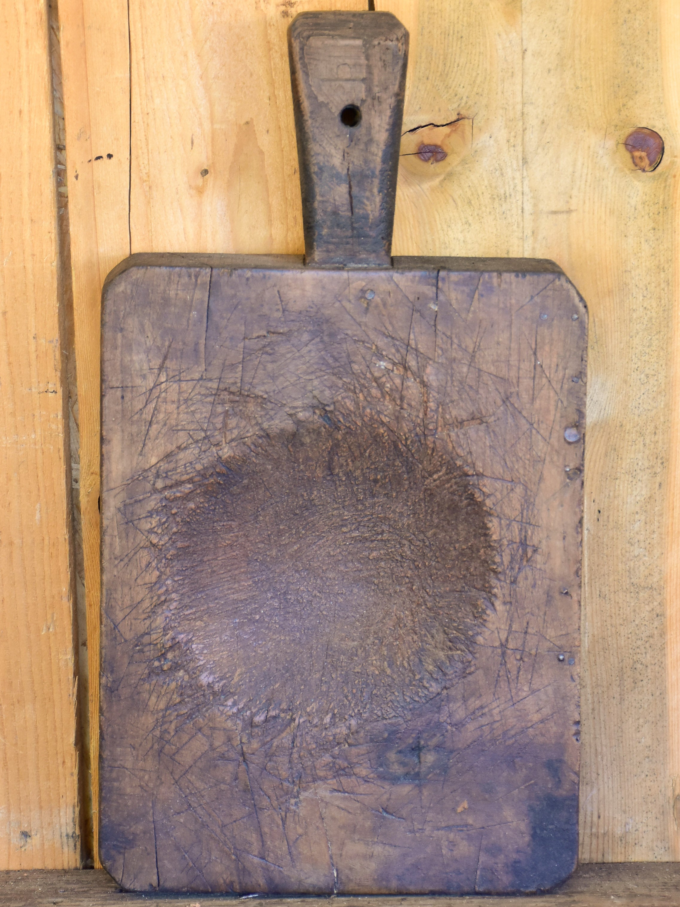 Rustic antique French cutting board with well