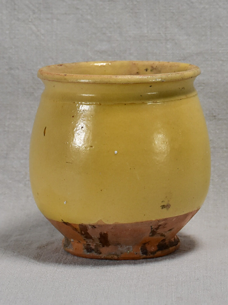 Antique French confit pot with no handles and yellow glaze 5"