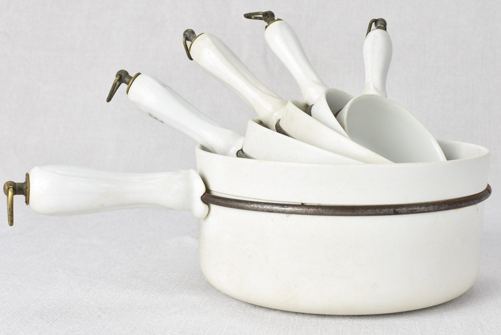 Set of 5 porcelain saucepans branded Cellinite CDV