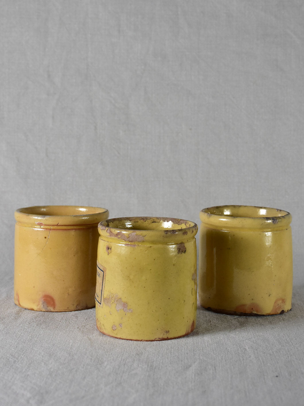 Three antique French yellow ware preserving jars 3½"