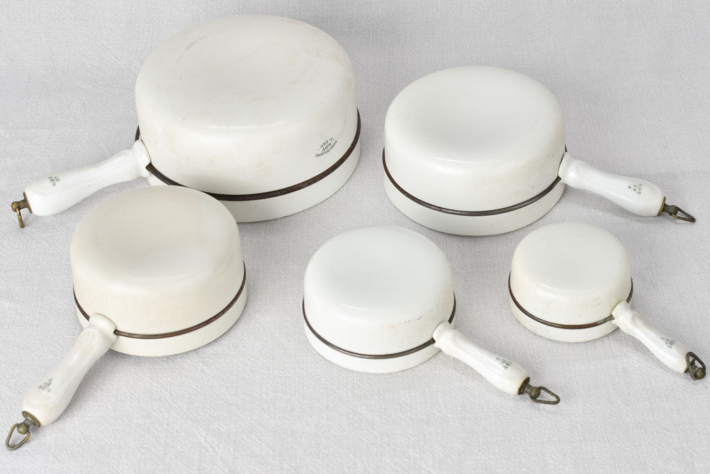 Set of 5 porcelain saucepans branded Cellinite CDV