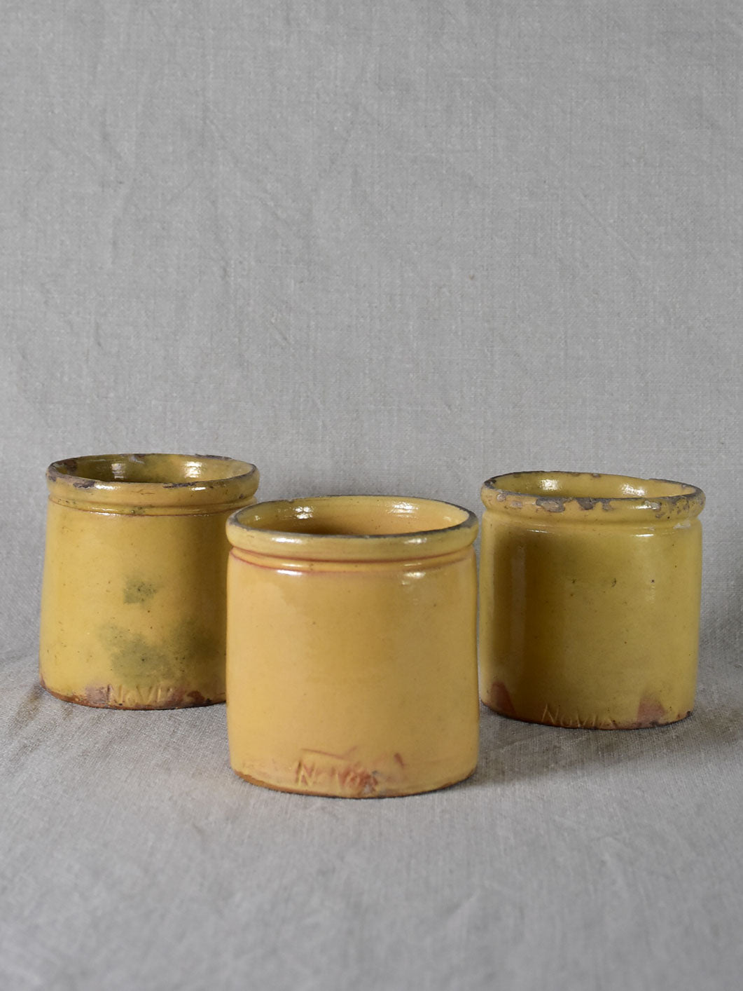 Three antique French yellow ware preserving jars 3½"