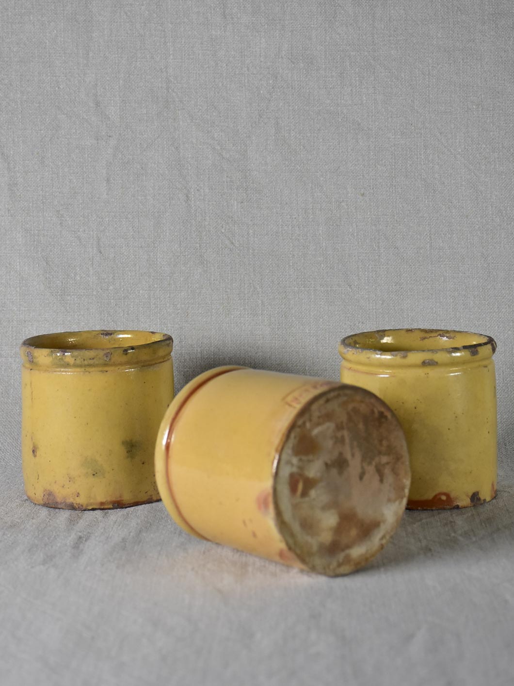 Three antique French yellow ware preserving jars 3½"