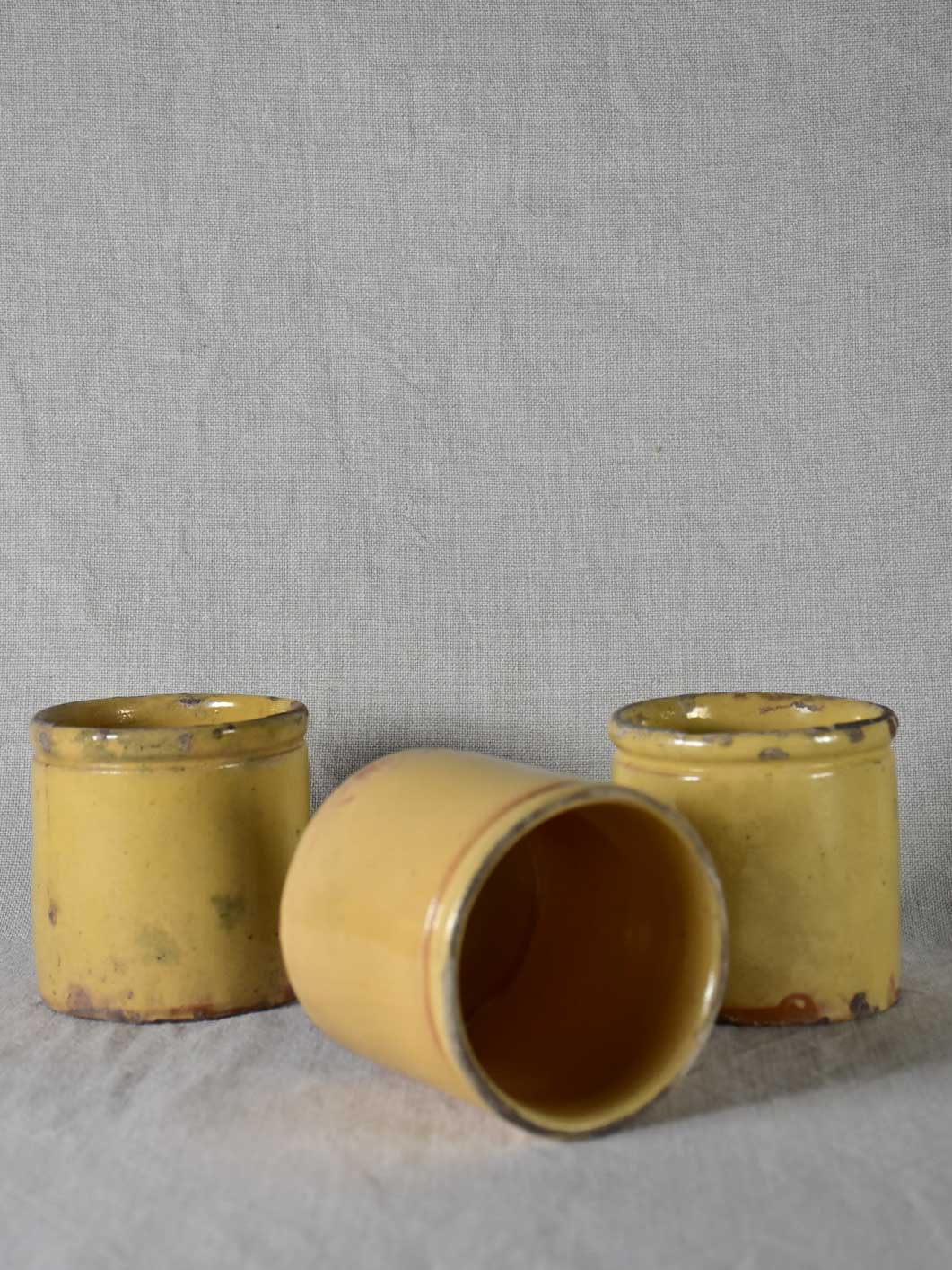 Three antique French yellow ware preserving jars 3½"