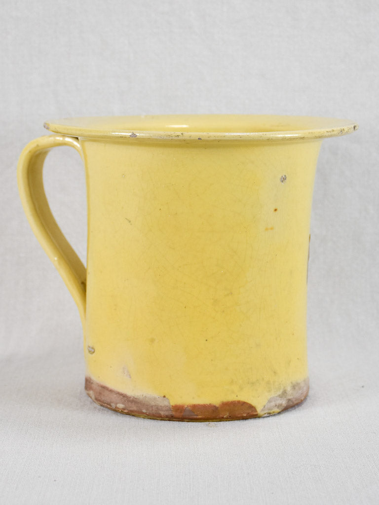 Late nineteenth-century French chamber pot with yellow glaze 8"