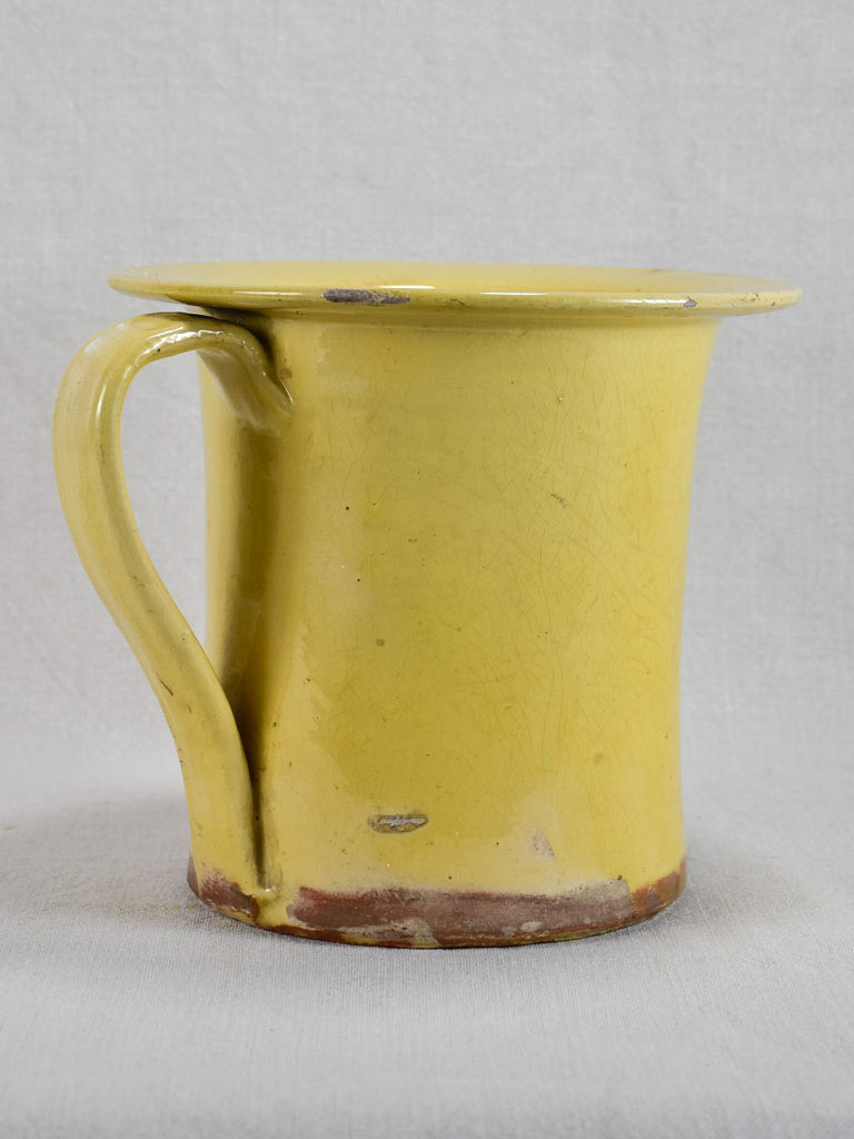Late nineteenth-century French chamber pot with yellow glaze 8"