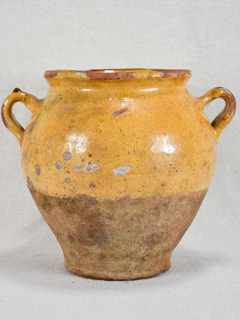 Round antique French confit pot with yellow glaze and green spot 8¼"