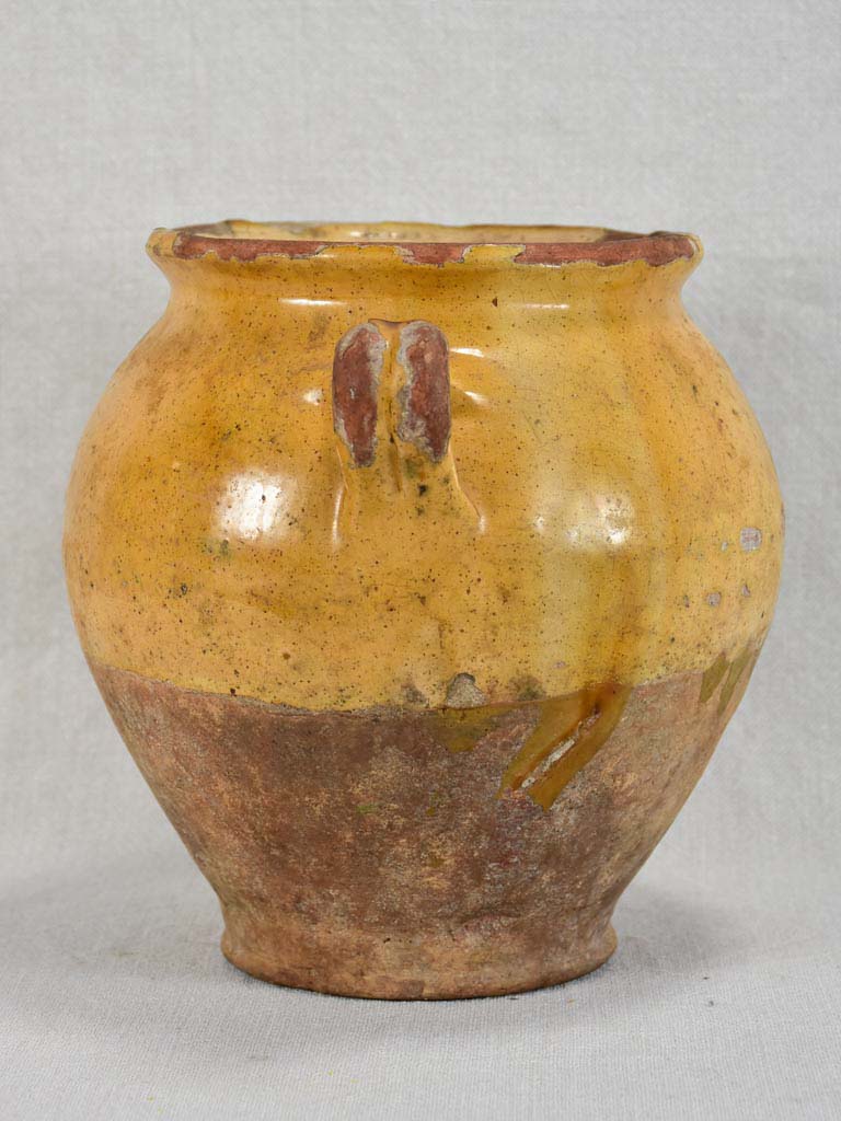Round antique French confit pot with yellow glaze and green spot 8¼"