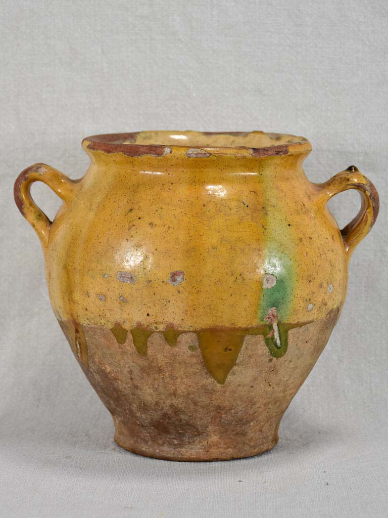 Round antique French confit pot with yellow glaze and green spot 8¼"