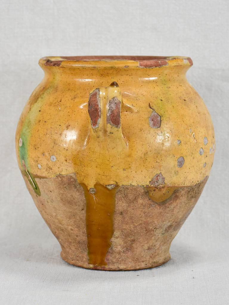 Round antique French confit pot with yellow glaze and green spot 8¼"