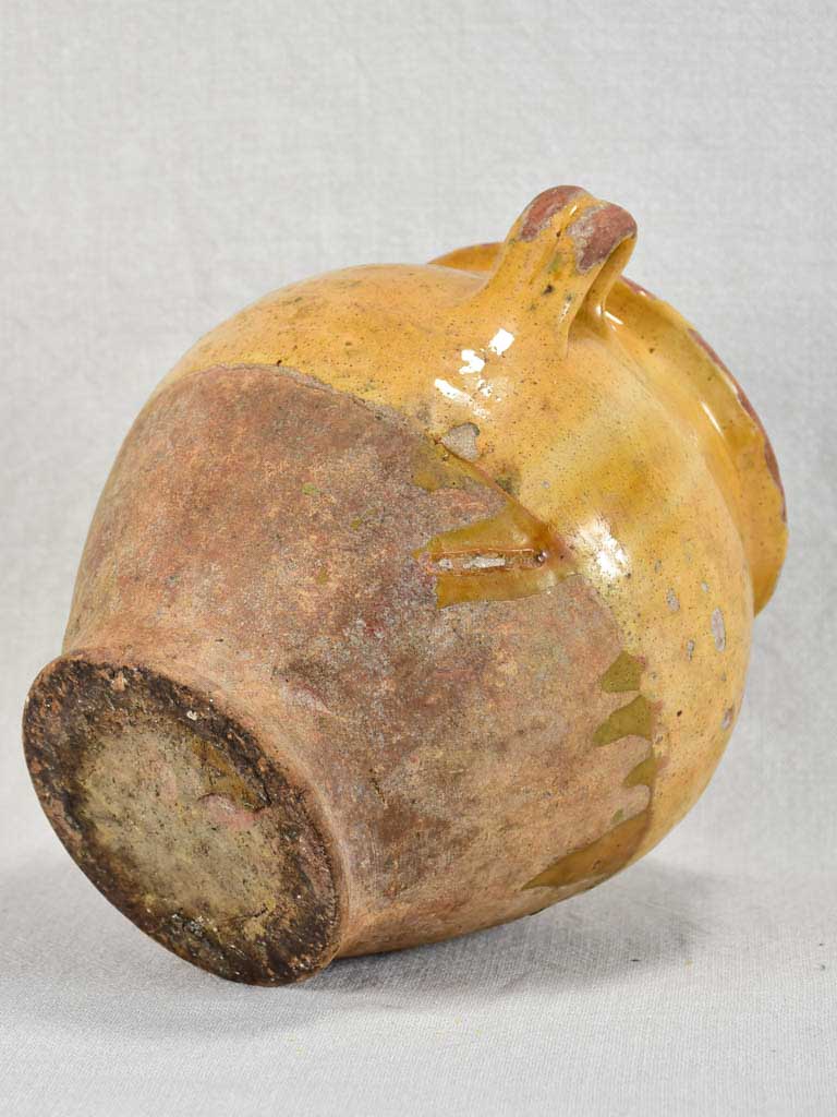 Round antique French confit pot with yellow glaze and green spot 8¼"
