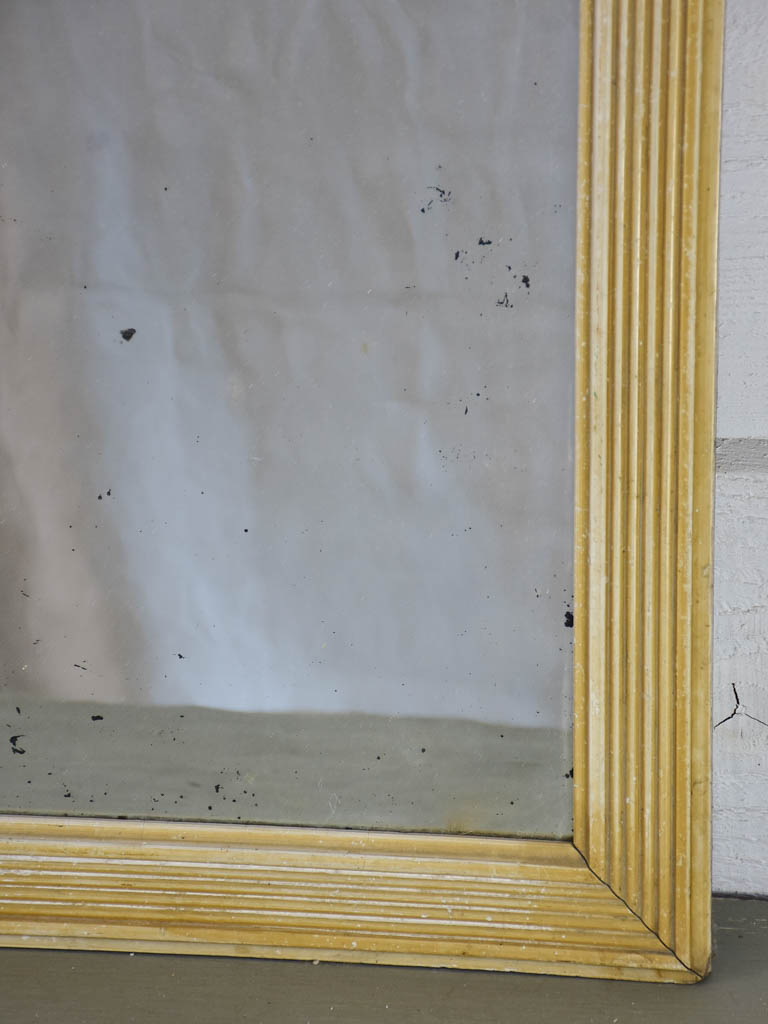 18th Century Louis XVI mirror with painted reeded frame and ripple glass 17¾" x 22½"