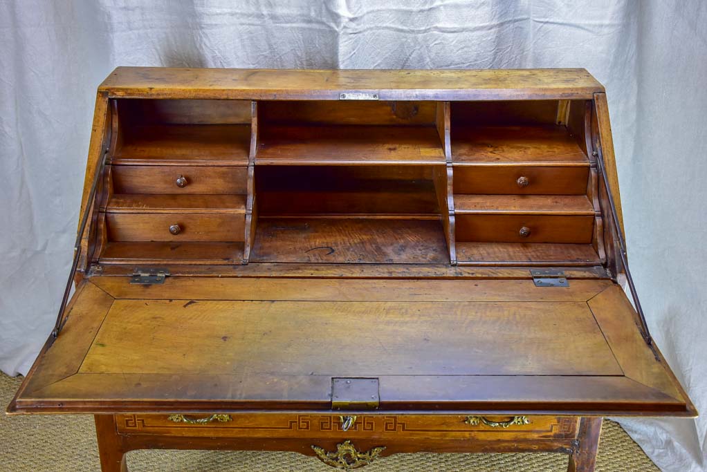 18th Century French secretaire with marquetry and two drawers