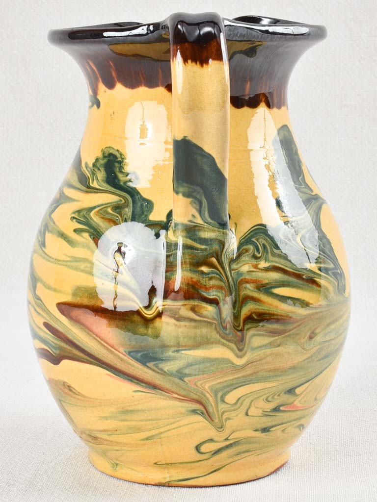 Vintage terracotta pitcher with colorful glaze 8¾"