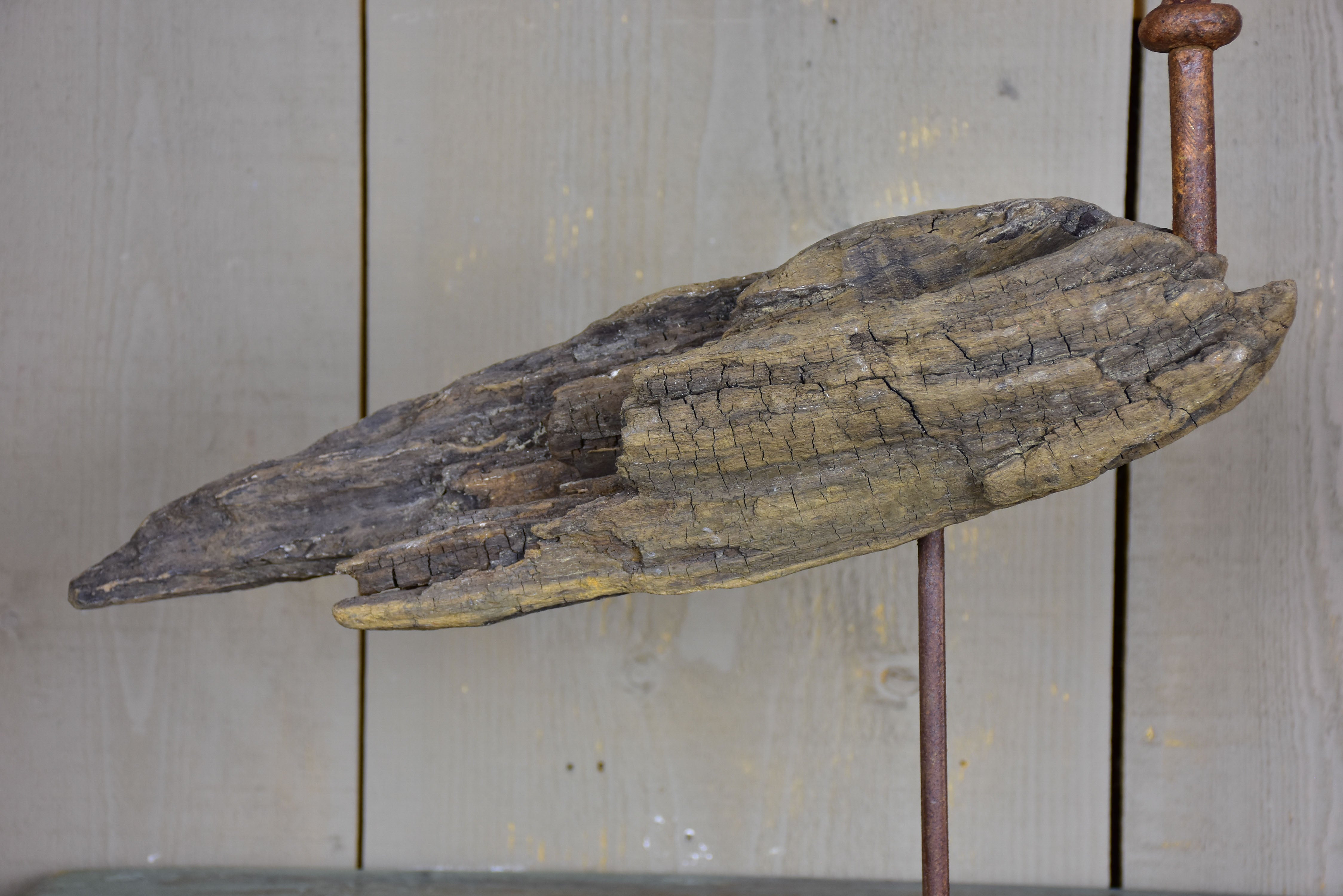 Bird sculpture made from salvaged driftwood and wrought iron