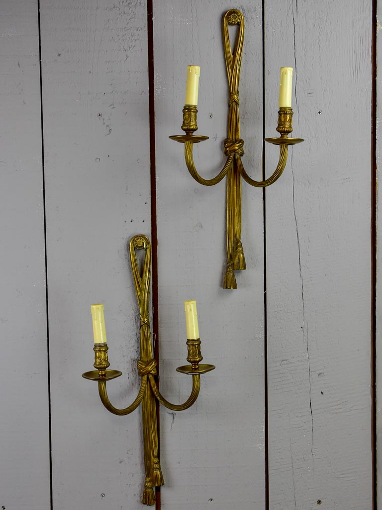 Pair of early 20th Century bronze wall appliques