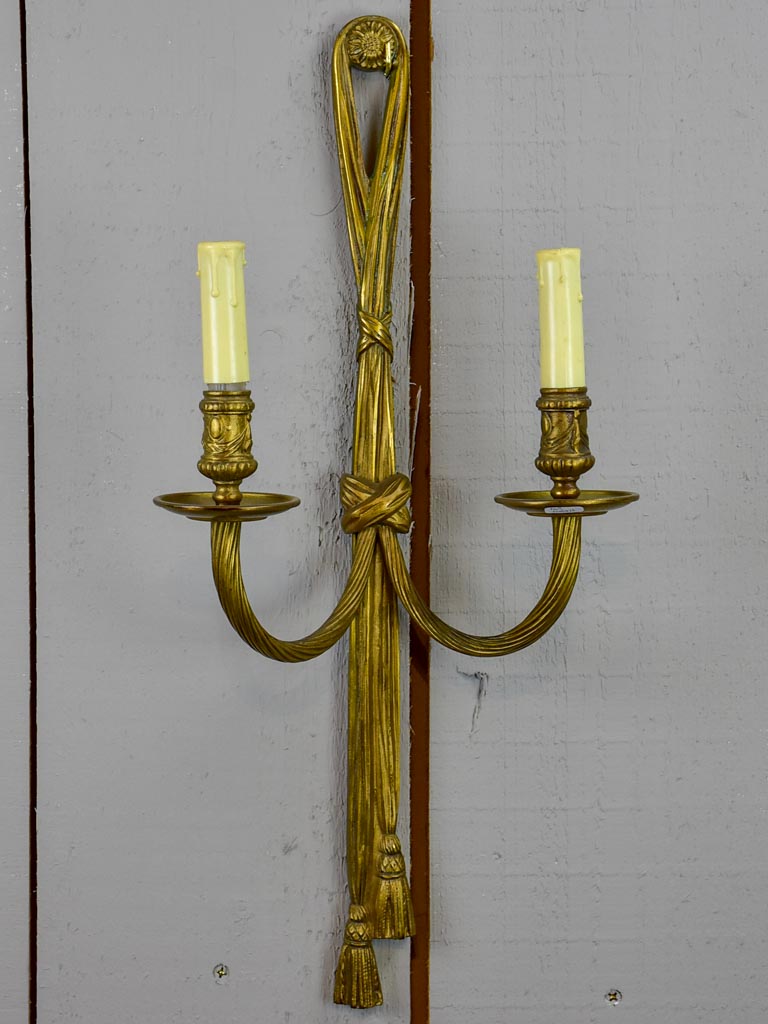 Pair of early 20th Century bronze wall appliques