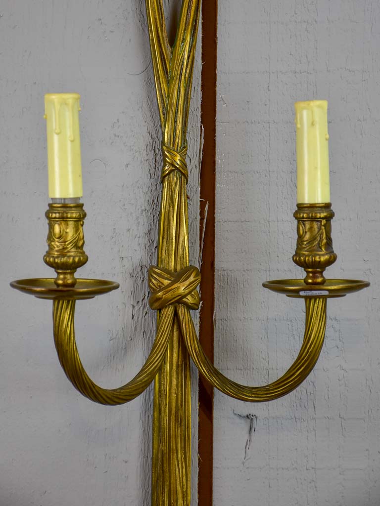 Pair of early 20th Century bronze wall appliques