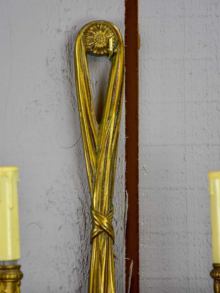 Pair of early 20th Century bronze wall appliques