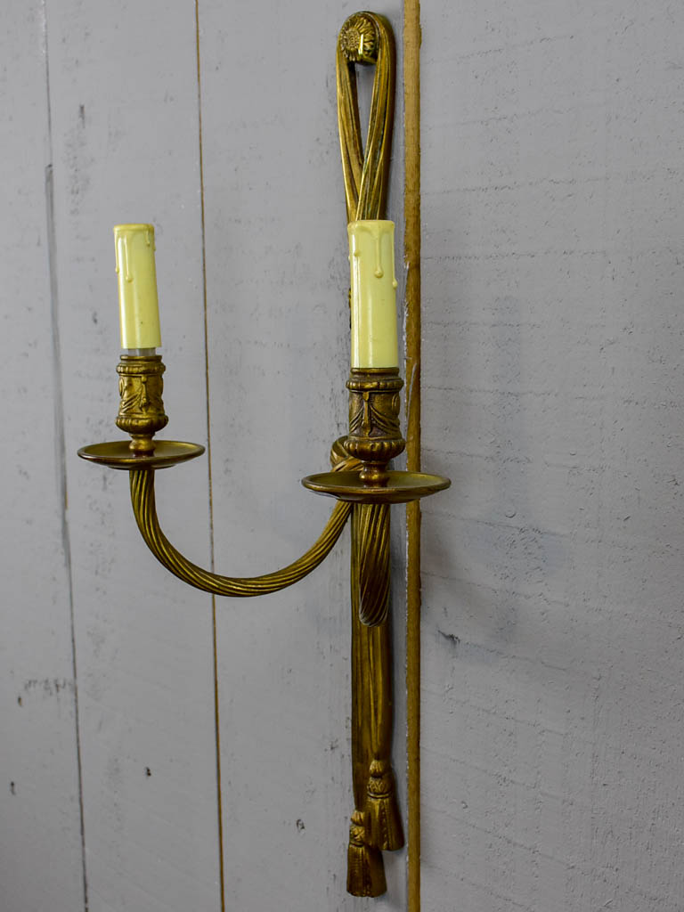 Pair of early 20th Century bronze wall appliques