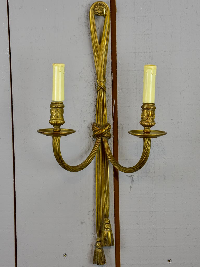 Pair of early 20th Century bronze wall appliques