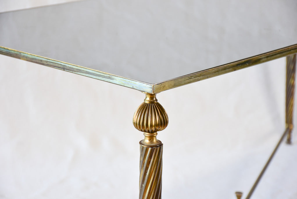 Mid century glass and brass coffee table with twisted tapered legs 39½" x 19¼"