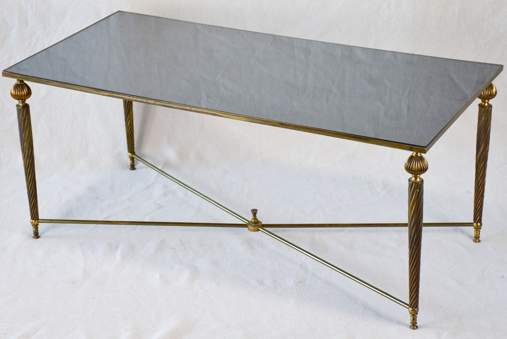 Mid century glass and brass coffee table with twisted tapered legs 39½" x 19¼"