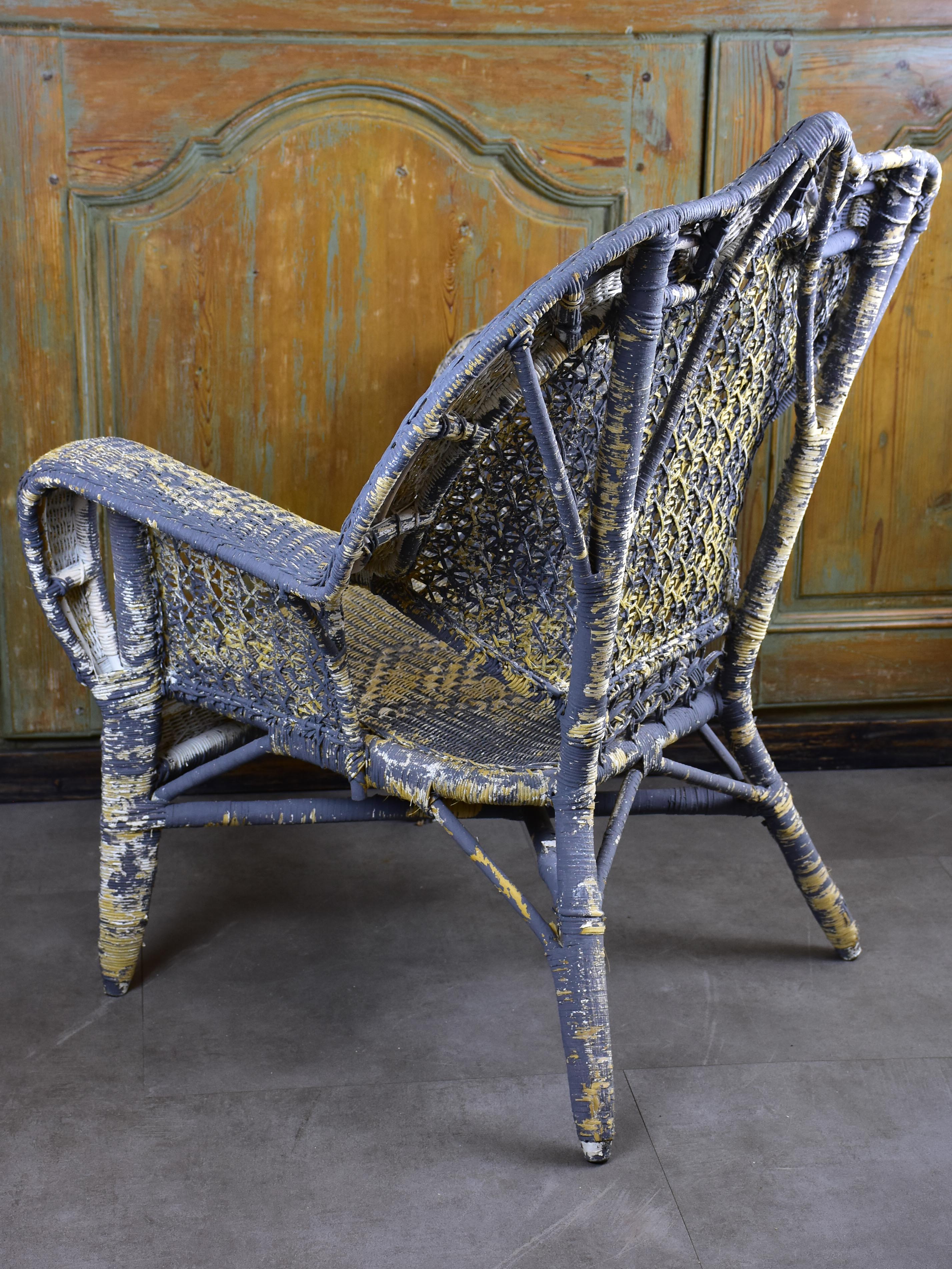 Antique French rattan armchair with blue patina