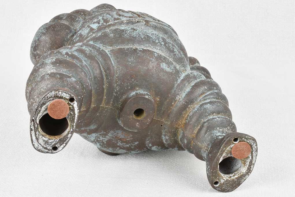 Large Michelin Bibendum from an air compressor with blue patina 14¼"