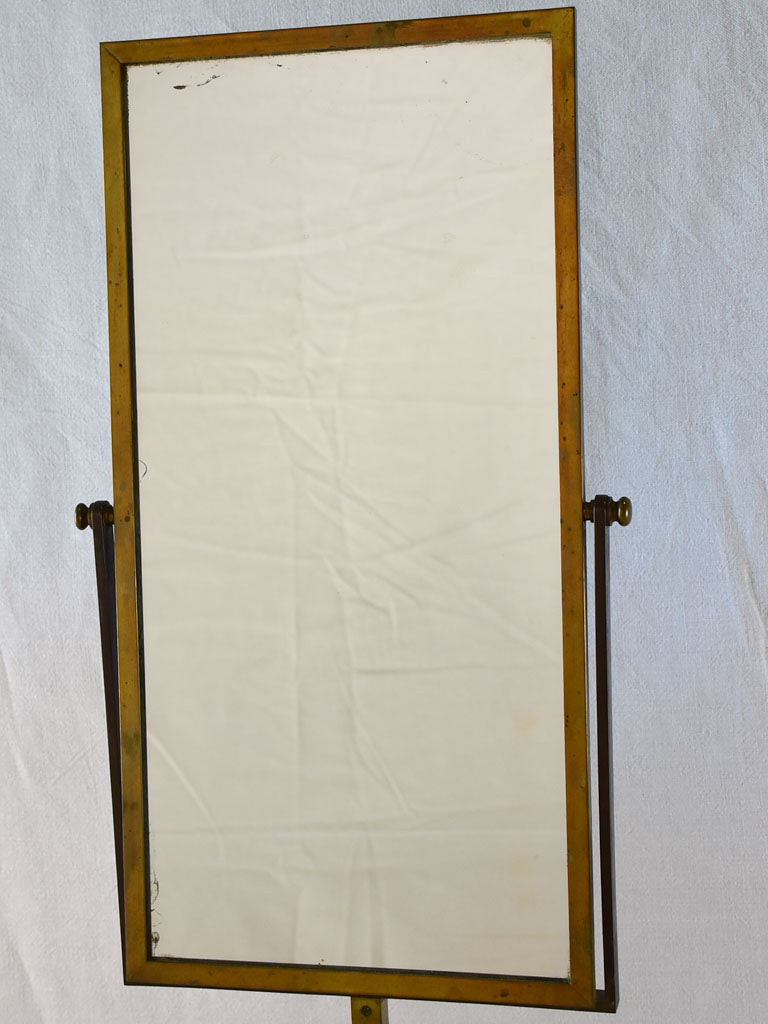 Tilting rectangular shop mirror from the 1900s. 43¾"