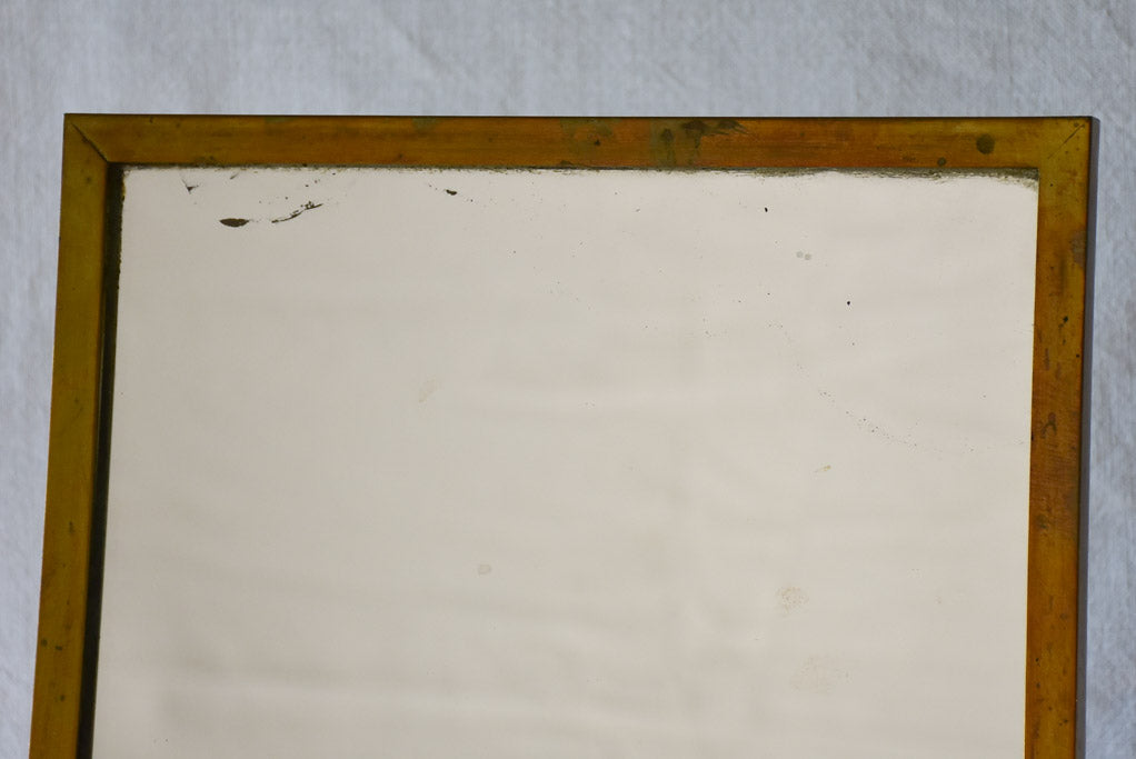 Tilting rectangular shop mirror from the 1900s. 43¾"