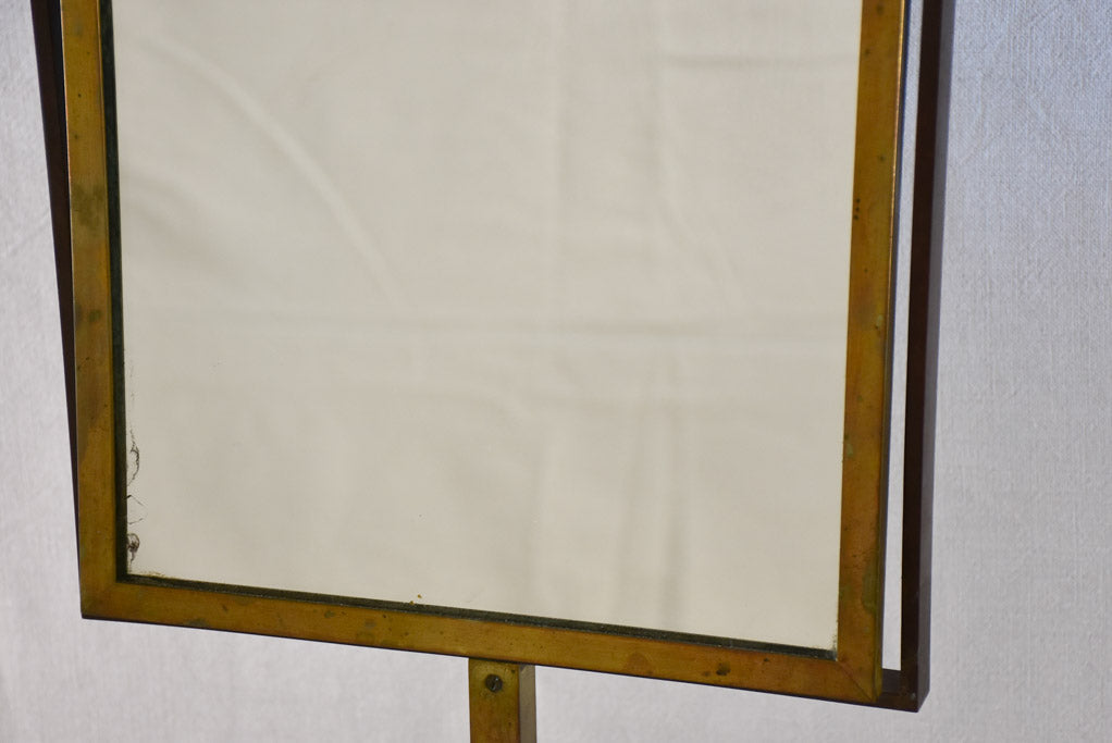 Tilting rectangular shop mirror from the 1900s. 43¾"