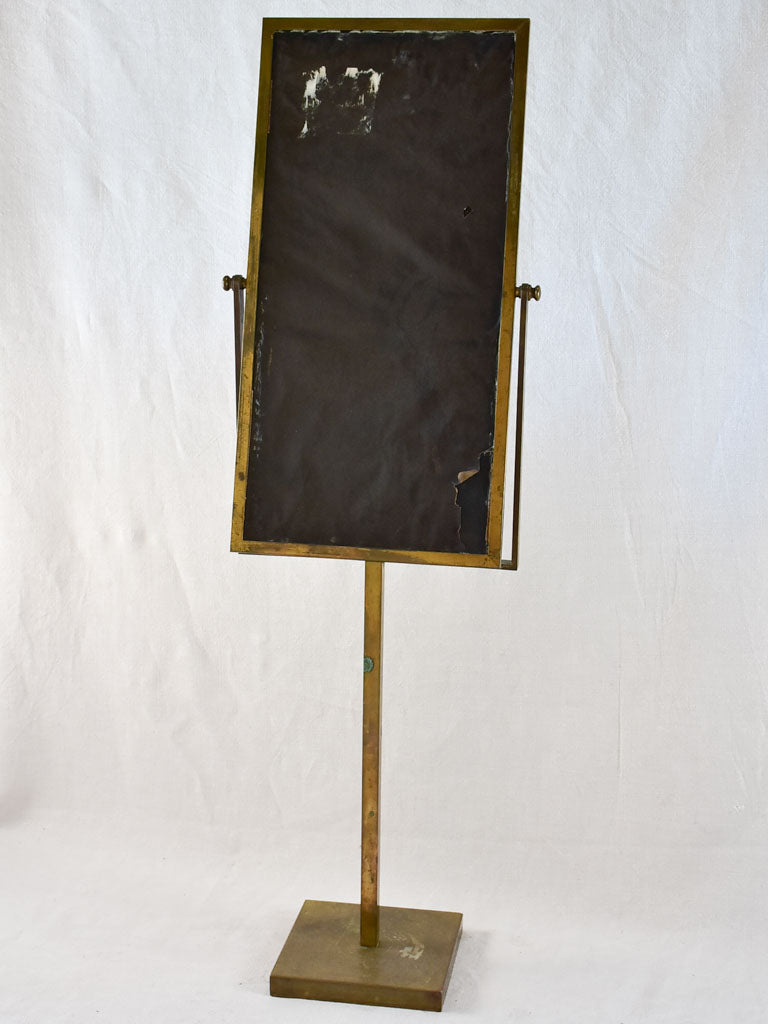 Tilting rectangular shop mirror from the 1900s. 43¾"