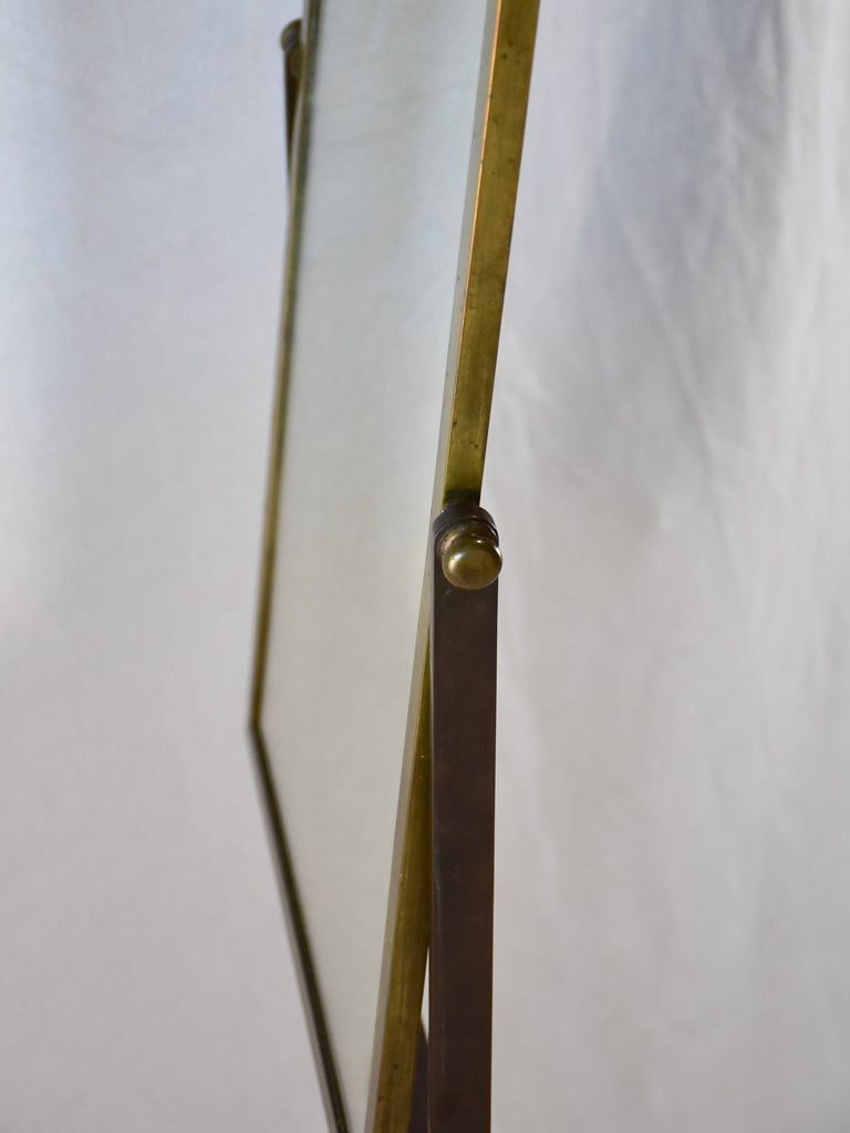 Tilting rectangular shop mirror from the 1900s. 43¾"