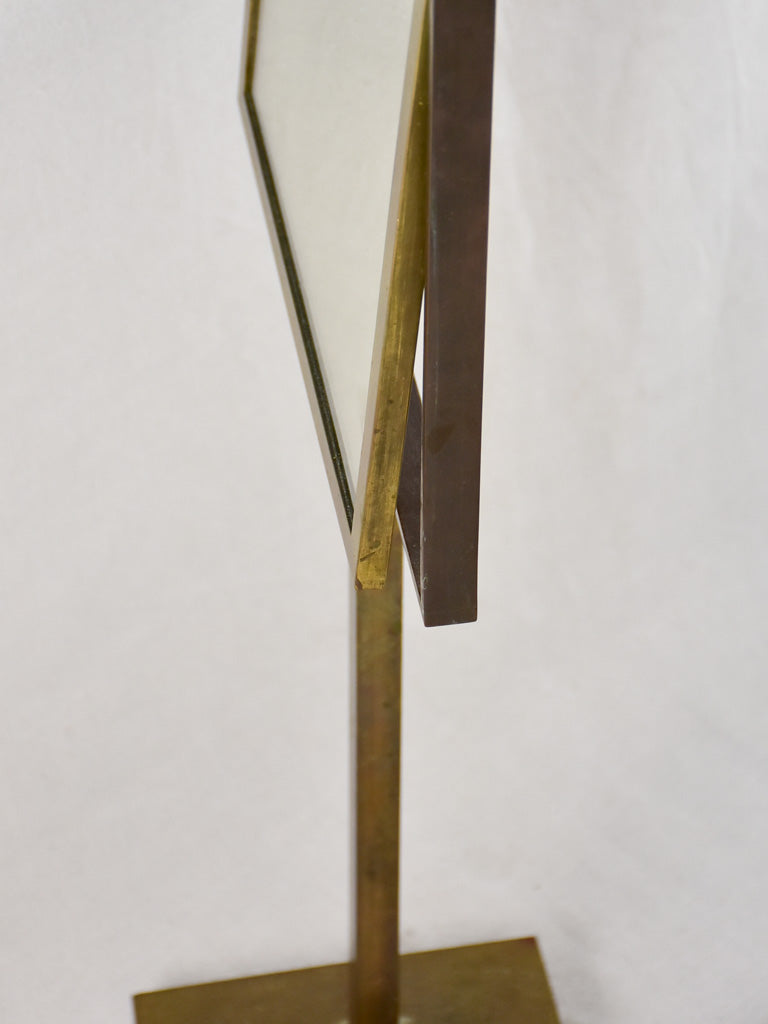 Tilting rectangular shop mirror from the 1900s. 43¾"